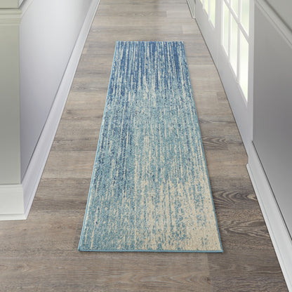 2' X 3' Blue and Ivory Abstract Power Loom Area Rug