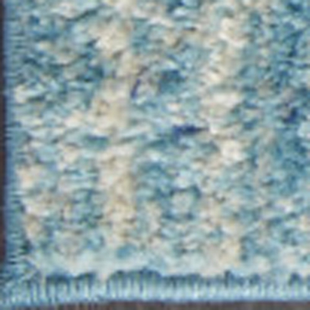 4' X 6' Blue And Ivory Abstract Area Rug