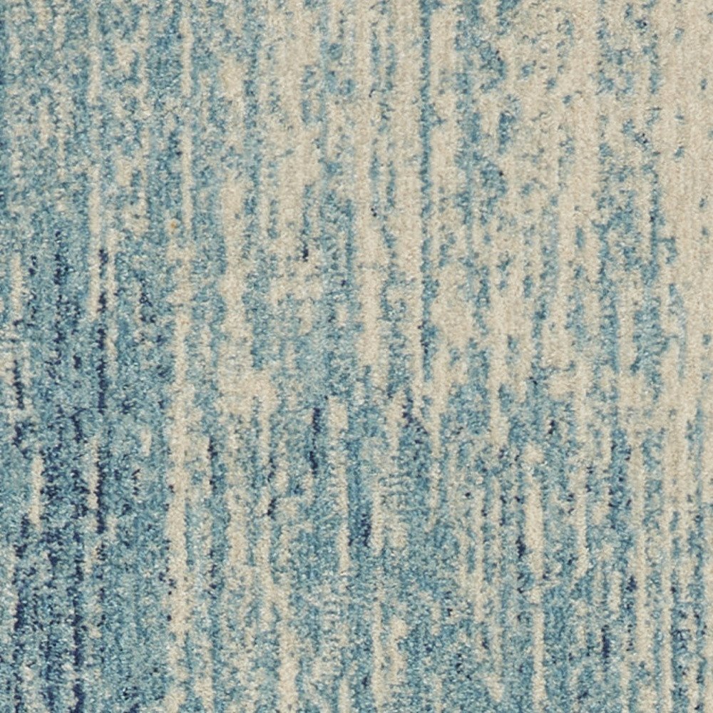 4' X 6' Blue And Ivory Abstract Area Rug