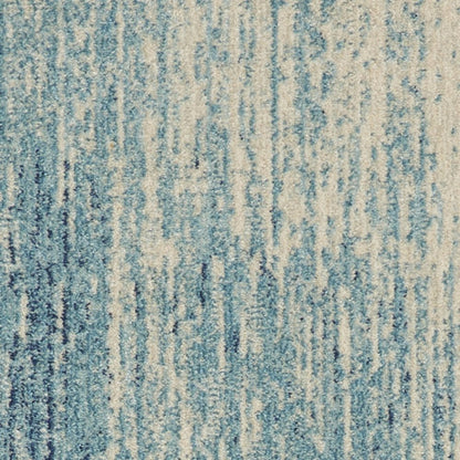 4' X 6' Blue And Ivory Abstract Area Rug