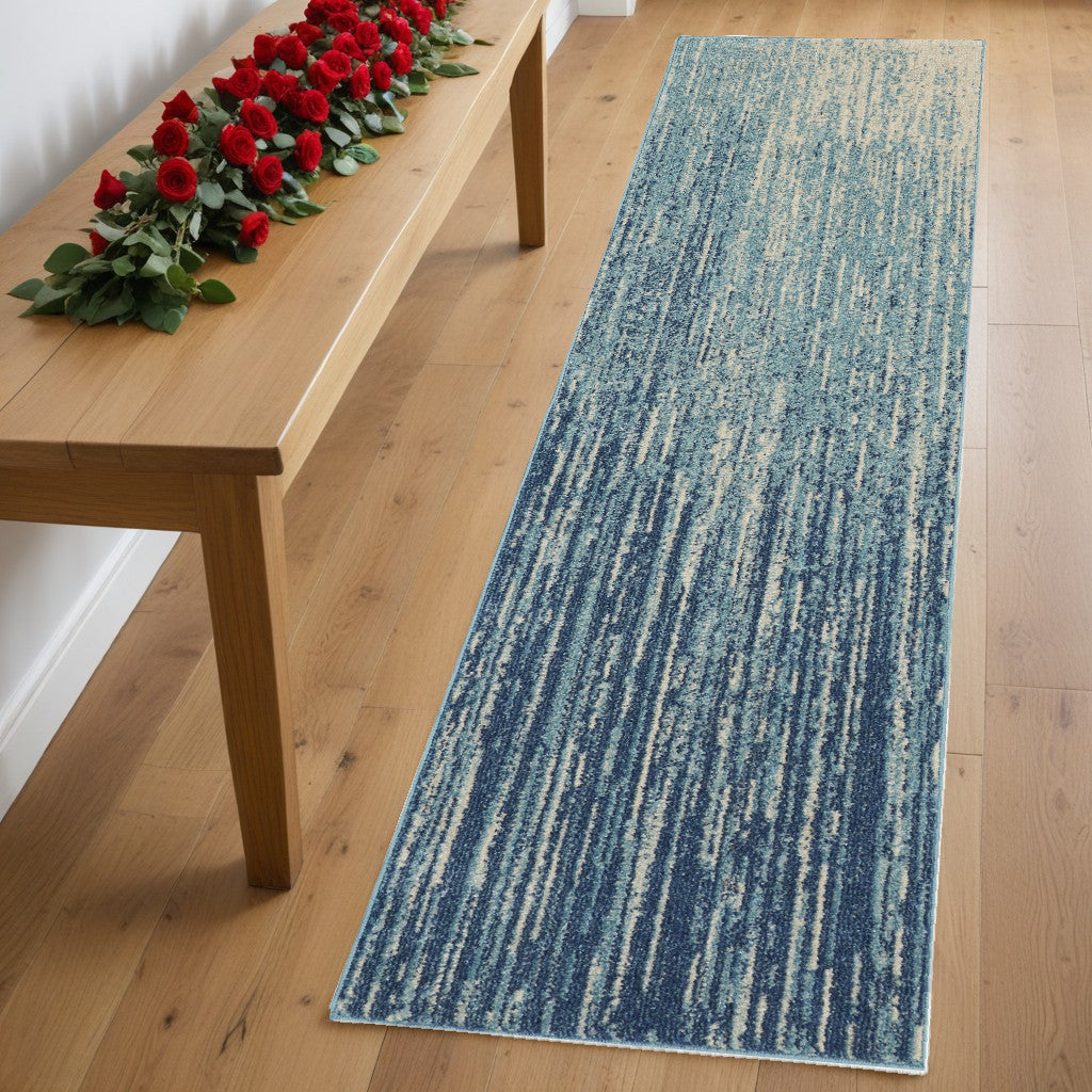 2' X 3' Blue and Ivory Abstract Power Loom Area Rug