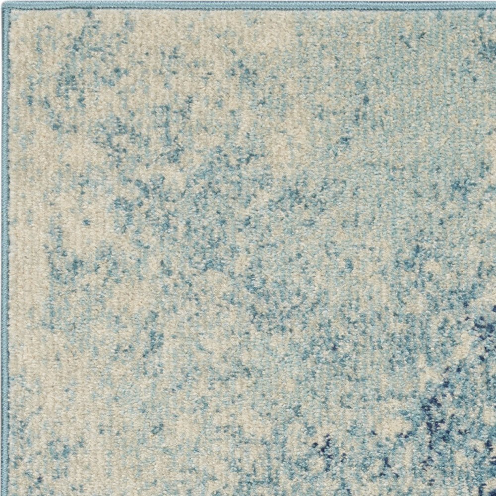 7' X 10' Blue And Ivory Abstract Area Rug
