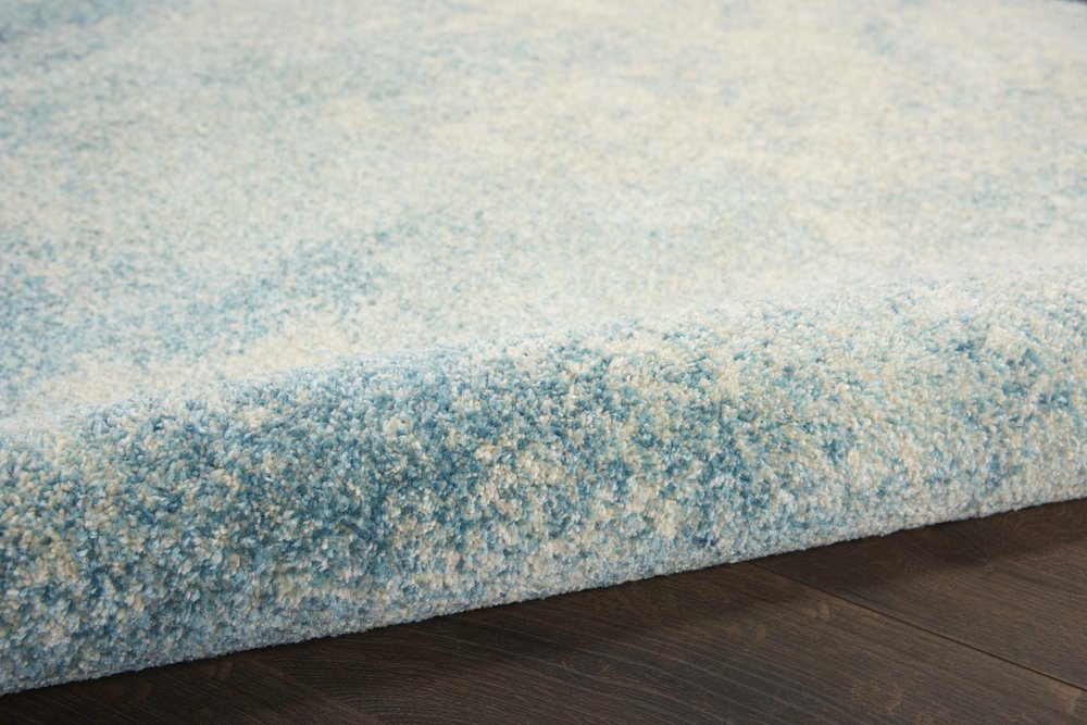 2' X 3' Blue And Ivory Abstract Area Rug