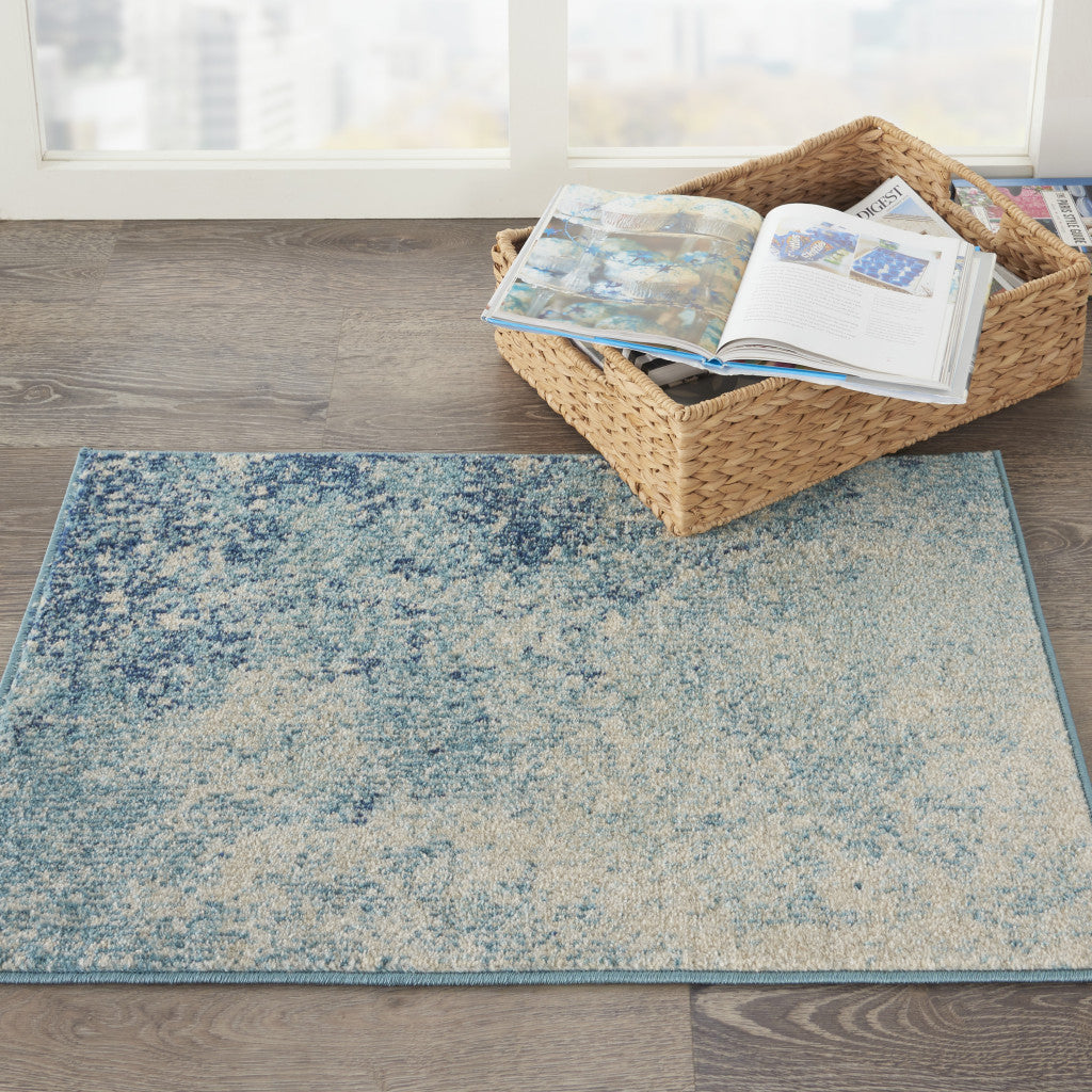 4' X 6' Ivory And Blue Abstract Power Loom Area Rug