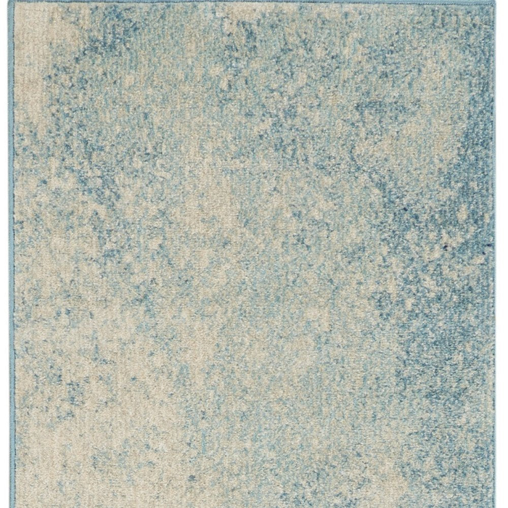 7' X 10' Blue And Ivory Abstract Area Rug