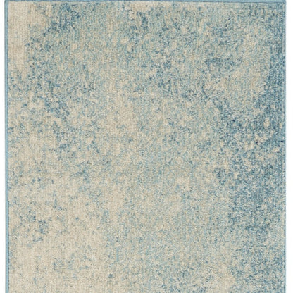 7' X 10' Blue And Ivory Abstract Area Rug