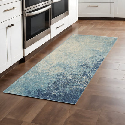 4' X 6' Blue And Ivory Abstract Area Rug