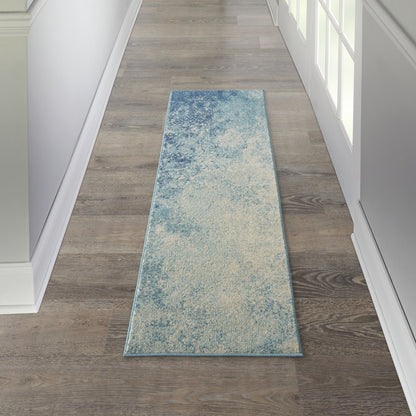 4' X 6' Blue And Ivory Abstract Area Rug