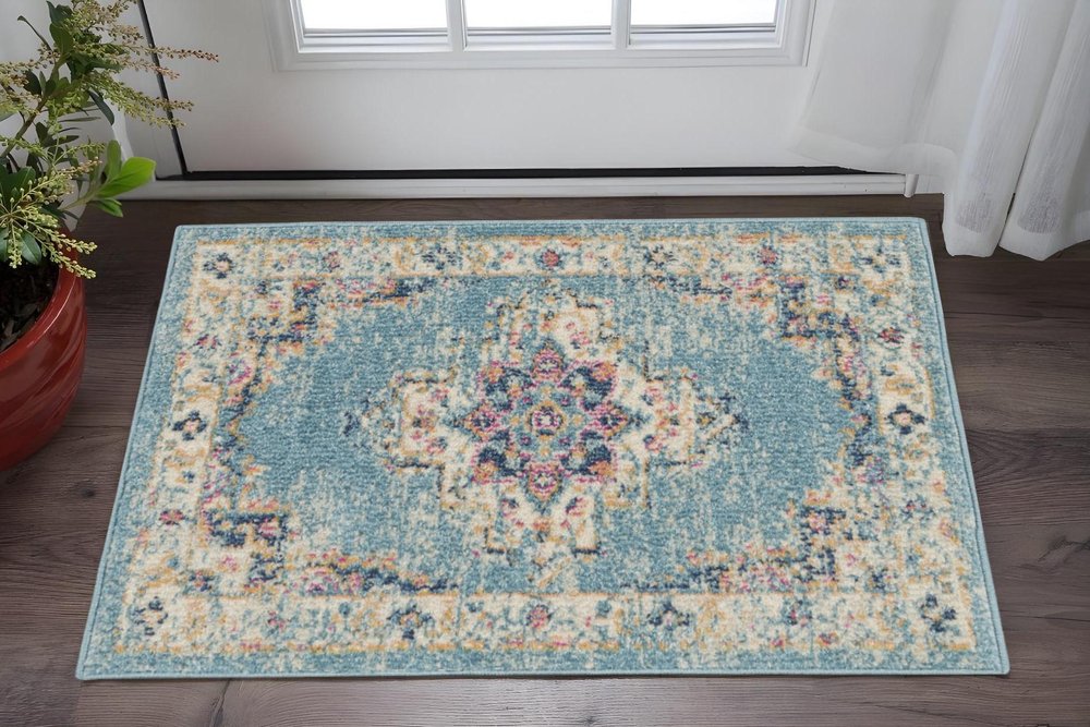 5' X 7' Blue And Ivory Southwestern Distressed Area Rug