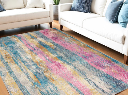 5' X 7' Blue Pink And Gold Abstract Distressed Area Rug