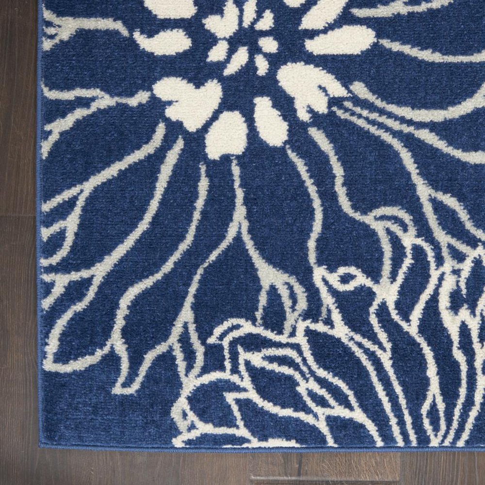 5' X 7' Blue And Ivory Floral Area Rug