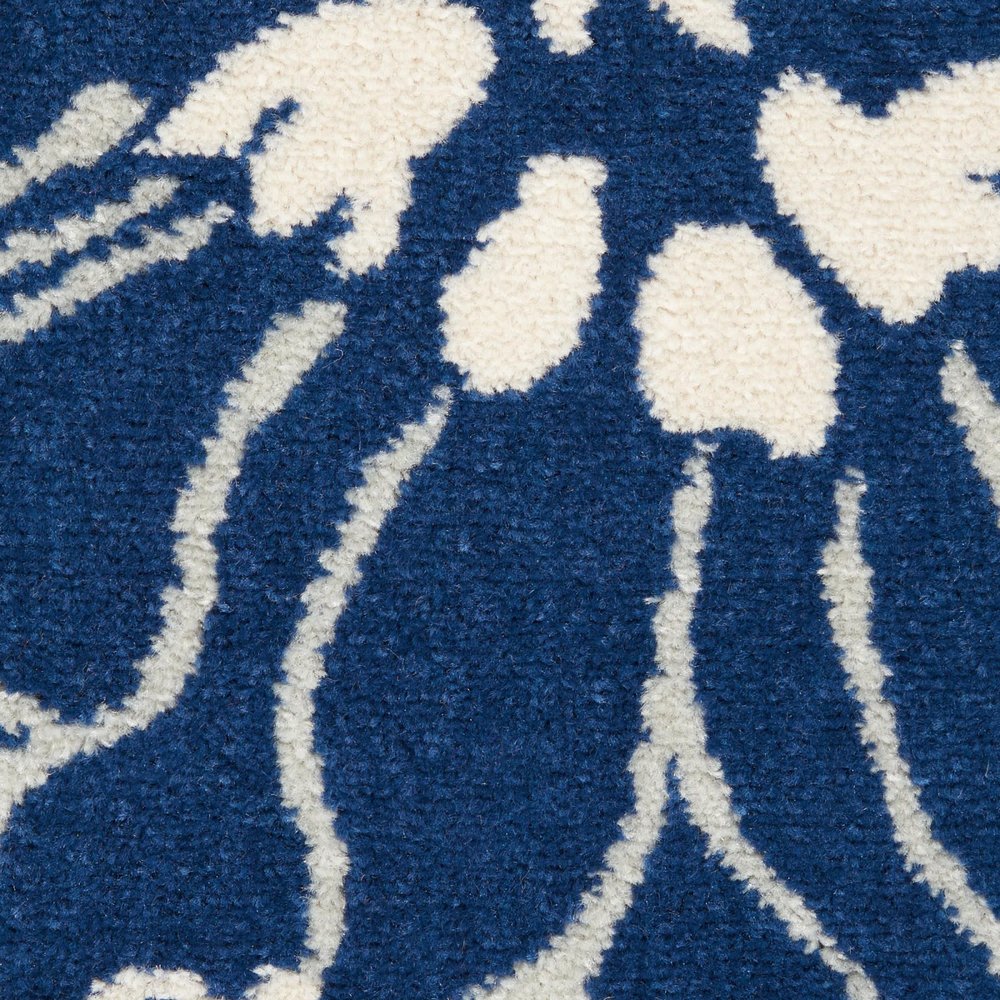 5' X 7' Blue And Ivory Floral Area Rug