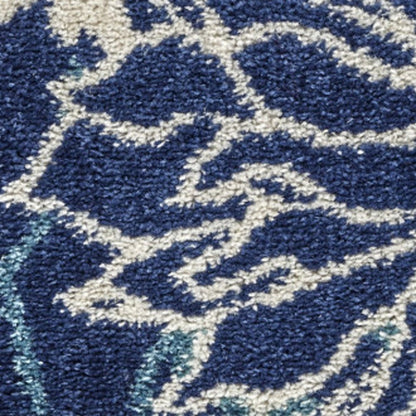 5' X 7' Blue And Ivory Floral Area Rug
