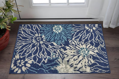 5' X 7' Blue And Ivory Floral Area Rug