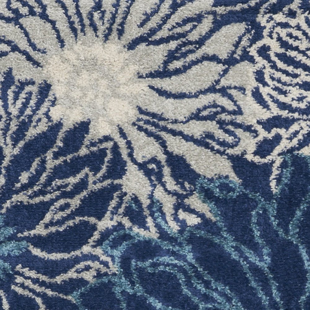 5' X 7' Blue And Ivory Floral Area Rug