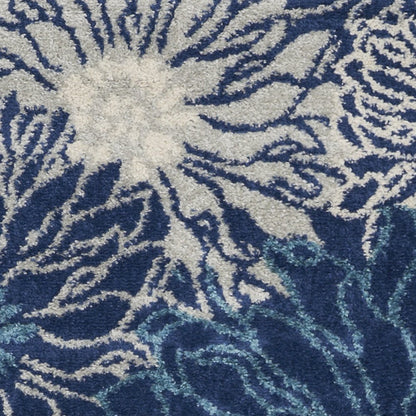 5' X 7' Blue And Ivory Floral Area Rug