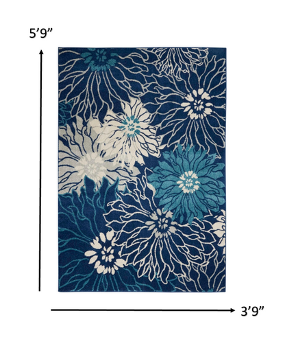 4' X 6' Blue And Ivory Floral Power Loom Area Rug