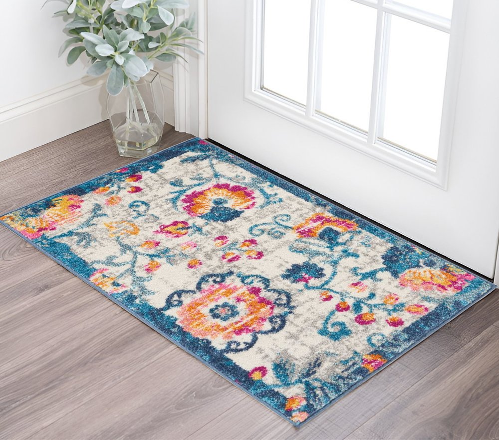 4' X 6' Ivory And Blue Floral Area Rug
