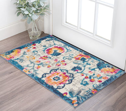 4' X 6' Ivory And Blue Floral Area Rug