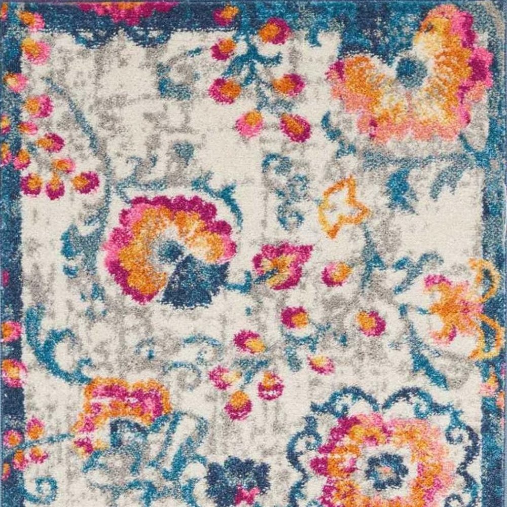 5' X 7' Ivory And Blue Floral Area Rug