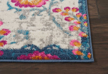 5' X 7' Ivory And Blue Floral Area Rug
