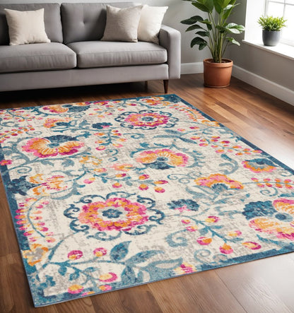 5' X 7' Ivory And Blue Floral Area Rug