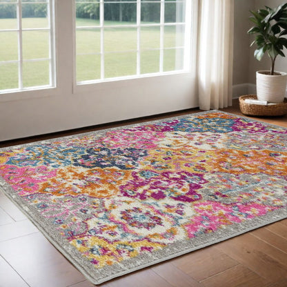 5' X 7' Gray Blue And Orange Quatrefoil Distressed Area Rug