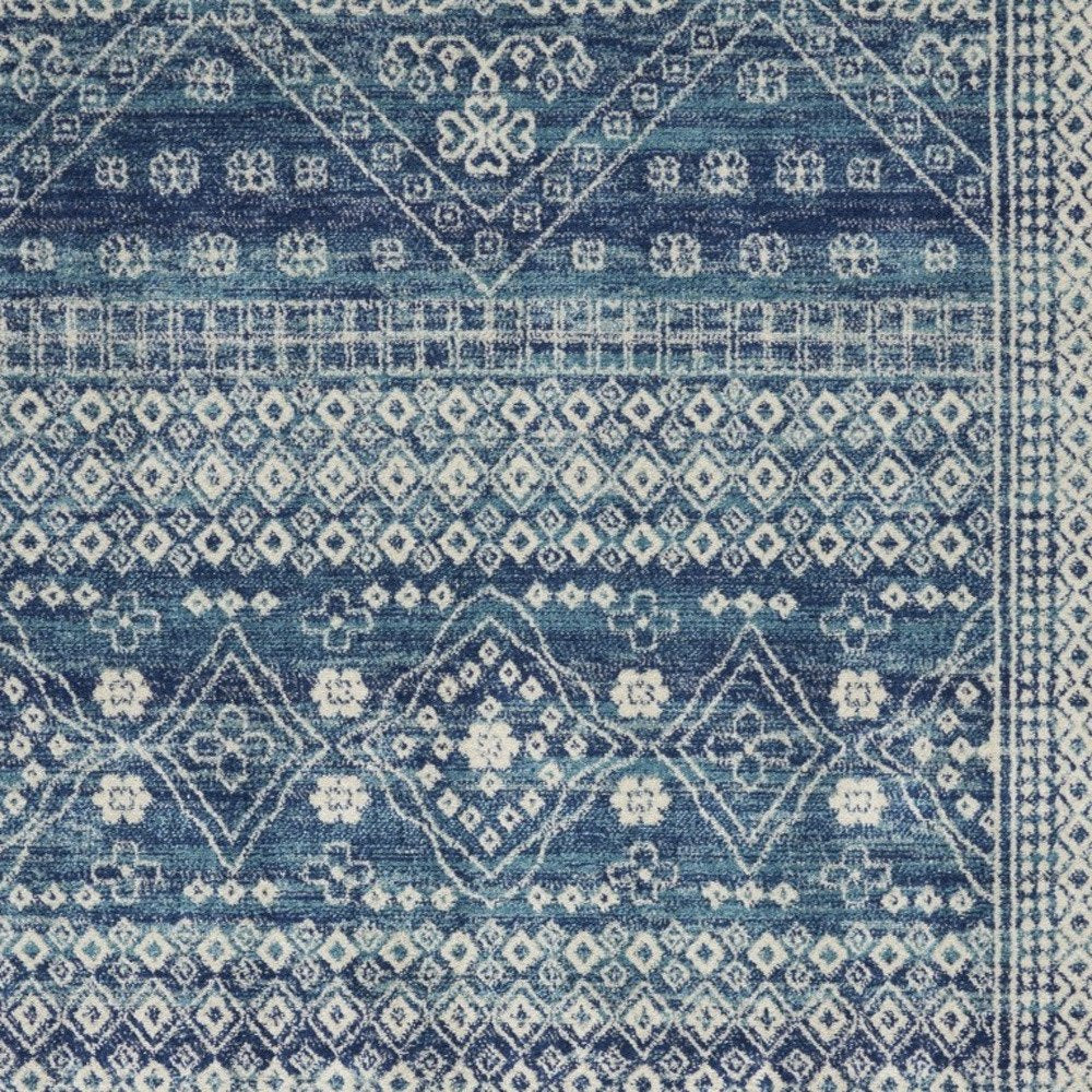 5' X 7' Navy Blue And Ivory Tribal Area Rug