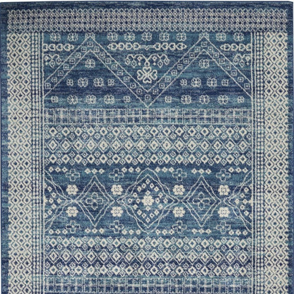 5' X 7' Navy Blue And Ivory Tribal Area Rug