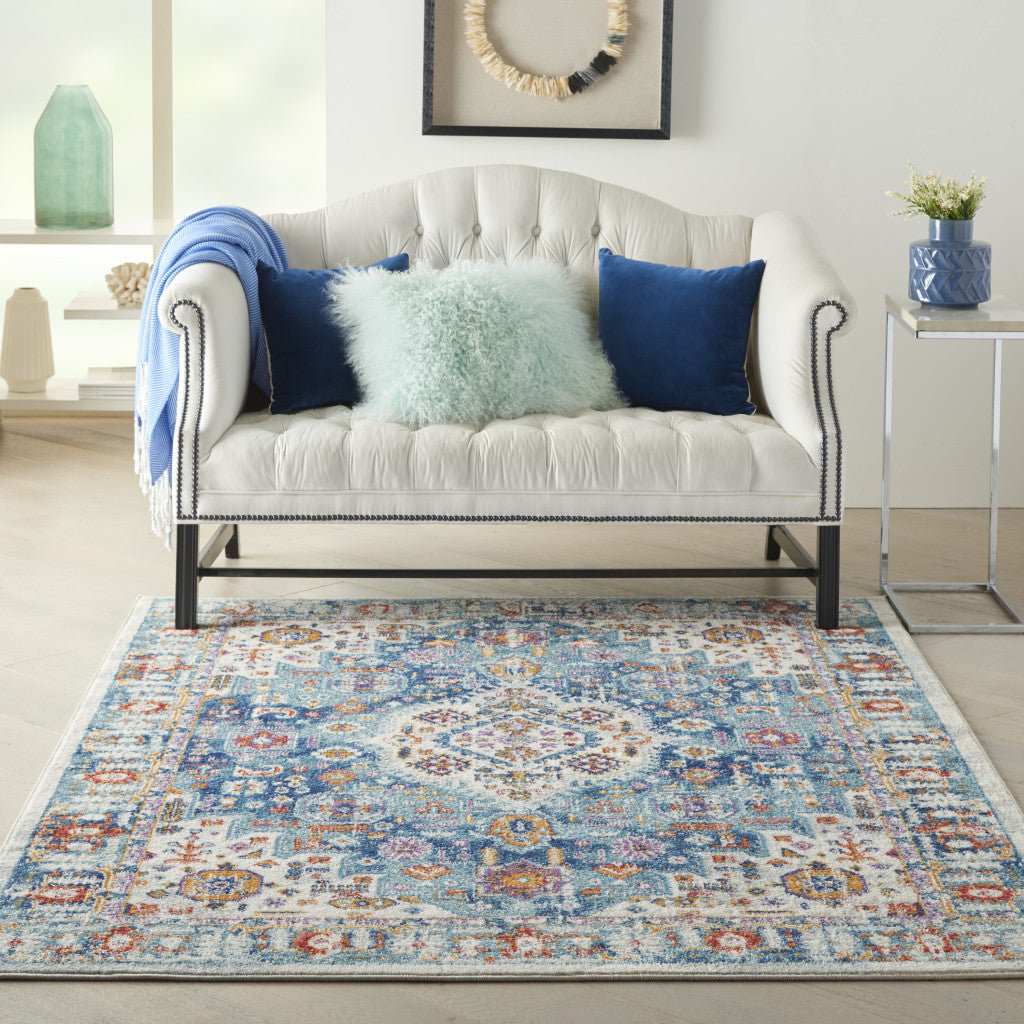 5' X 7' Blue And Ivory Power Loom Area Rug