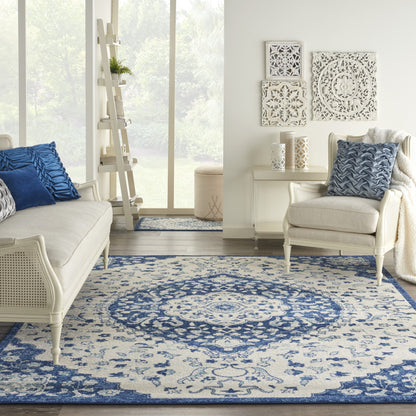 8' X 10' Blue And Ivory Power Loom Area Rug