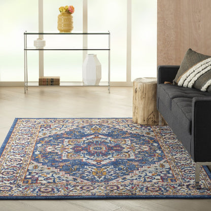 5' X 7' Blue And Ivory Medallion Distressed Area Rug