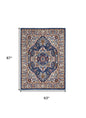 5' X 7' Blue And Ivory Medallion Distressed Area Rug