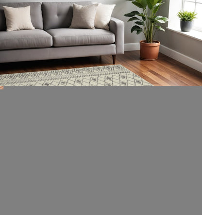 5' X 7' Gray And Ivory Geometric Area Rug