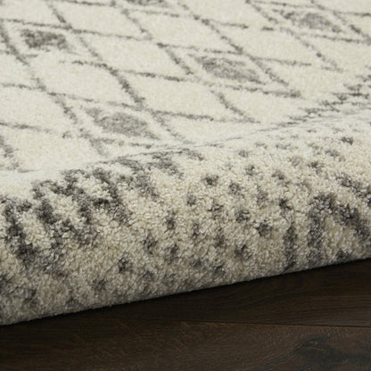 5' X 7' Gray And Ivory Geometric Area Rug