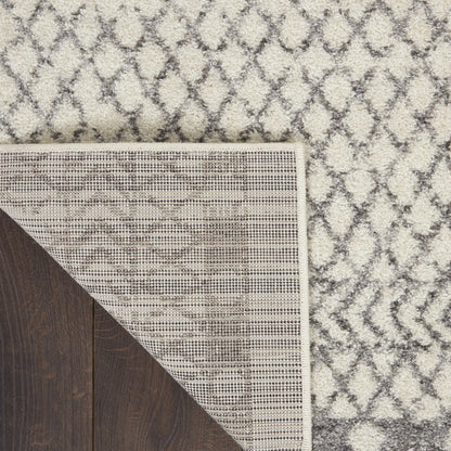 5' X 7' Gray And Ivory Geometric Distressed Area Rug