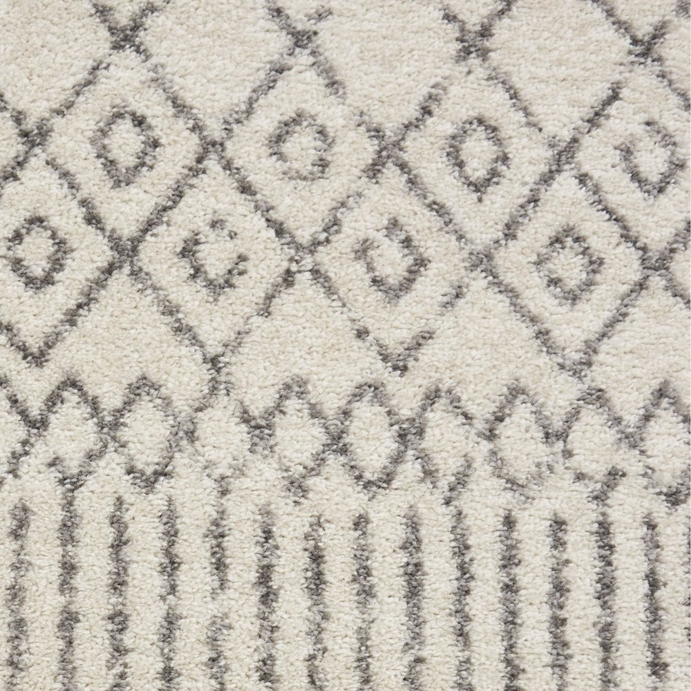 5' X 7' Gray And Ivory Geometric Distressed Area Rug
