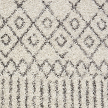 5' X 7' Gray And Ivory Geometric Distressed Area Rug