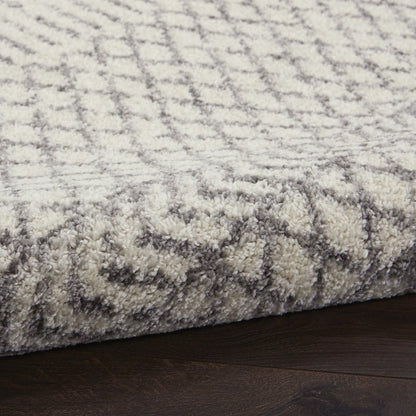 5' X 7' Gray And Ivory Geometric Distressed Area Rug