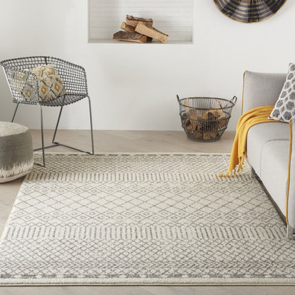 5' X 7' Gray And Ivory Geometric Distressed Area Rug