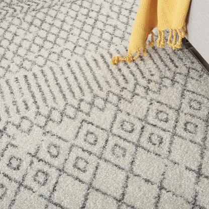 5' X 7' Gray And Ivory Geometric Distressed Area Rug