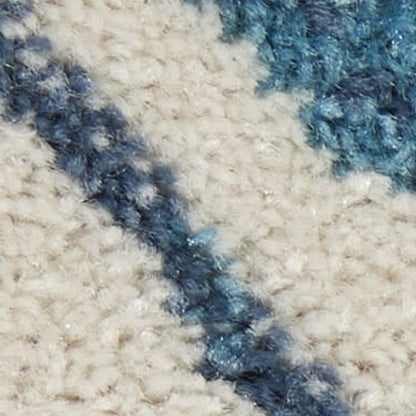 5' X 7' Ivory And Blue Geometric Area Rug