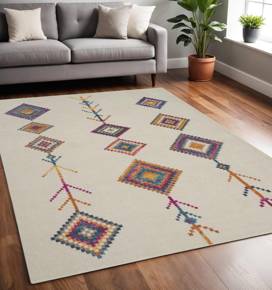 5' X 7' Blue Ivory And Pink Geometric Area Rug