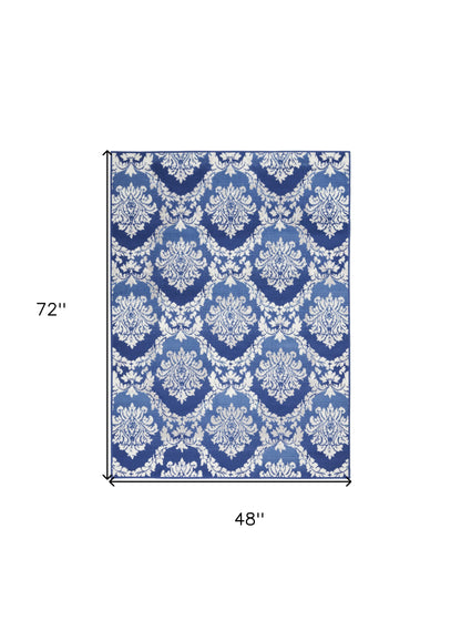 6' X 9' Blue Floral Dhurrie Area Rug