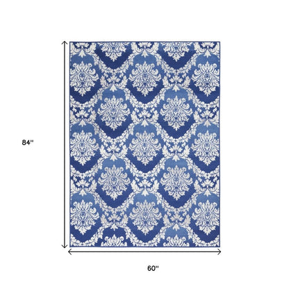 6' X 9' Blue And Ivory Damask Distressed Area Rug