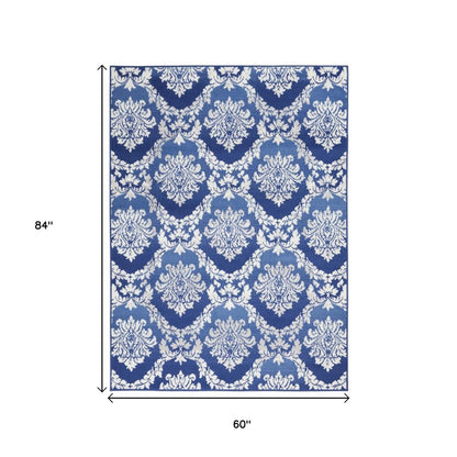 5' X 7' Blue And Ivory Damask Distressed Area Rug