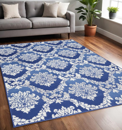 4' X 6' Ivory And Blue Damask Distressed Area Rug