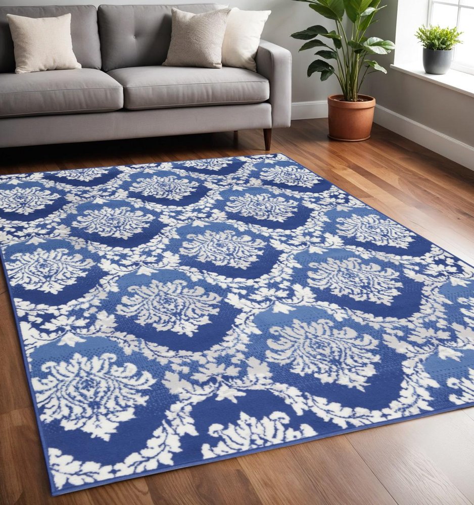 5' X 7' Blue And Ivory Damask Distressed Area Rug
