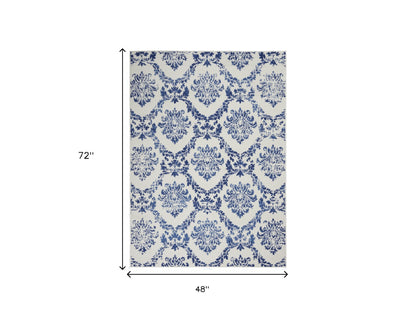 6' X 9' Blue Floral Dhurrie Area Rug