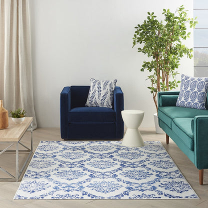 6' X 9' Blue And Ivory Damask Distressed Area Rug